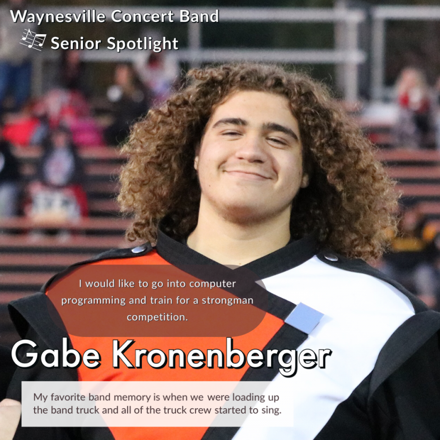 boy with big hair and a band uniform